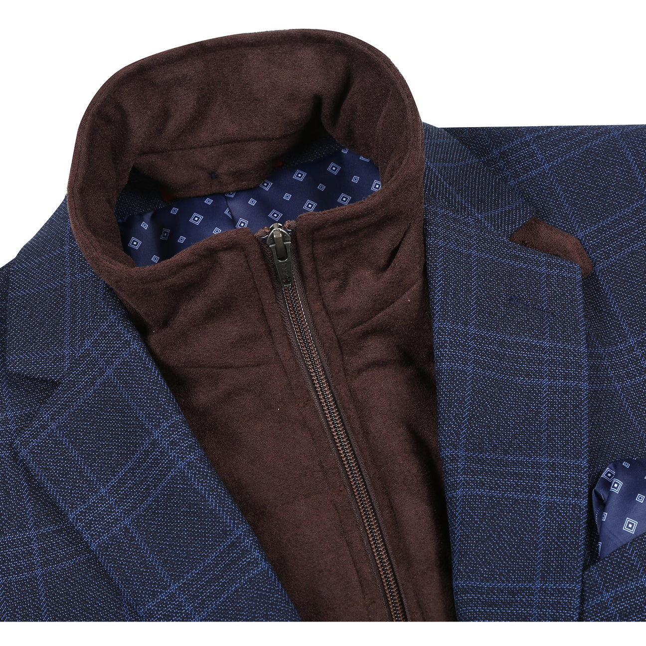 The Alessandro Vitello by Renoir Classic Fit Bib Blue Blazer 294-34, featuring a notch lapel and plaid pattern, is styled with pockets, a patterned pocket square, and worn over a brown zip-up vest.