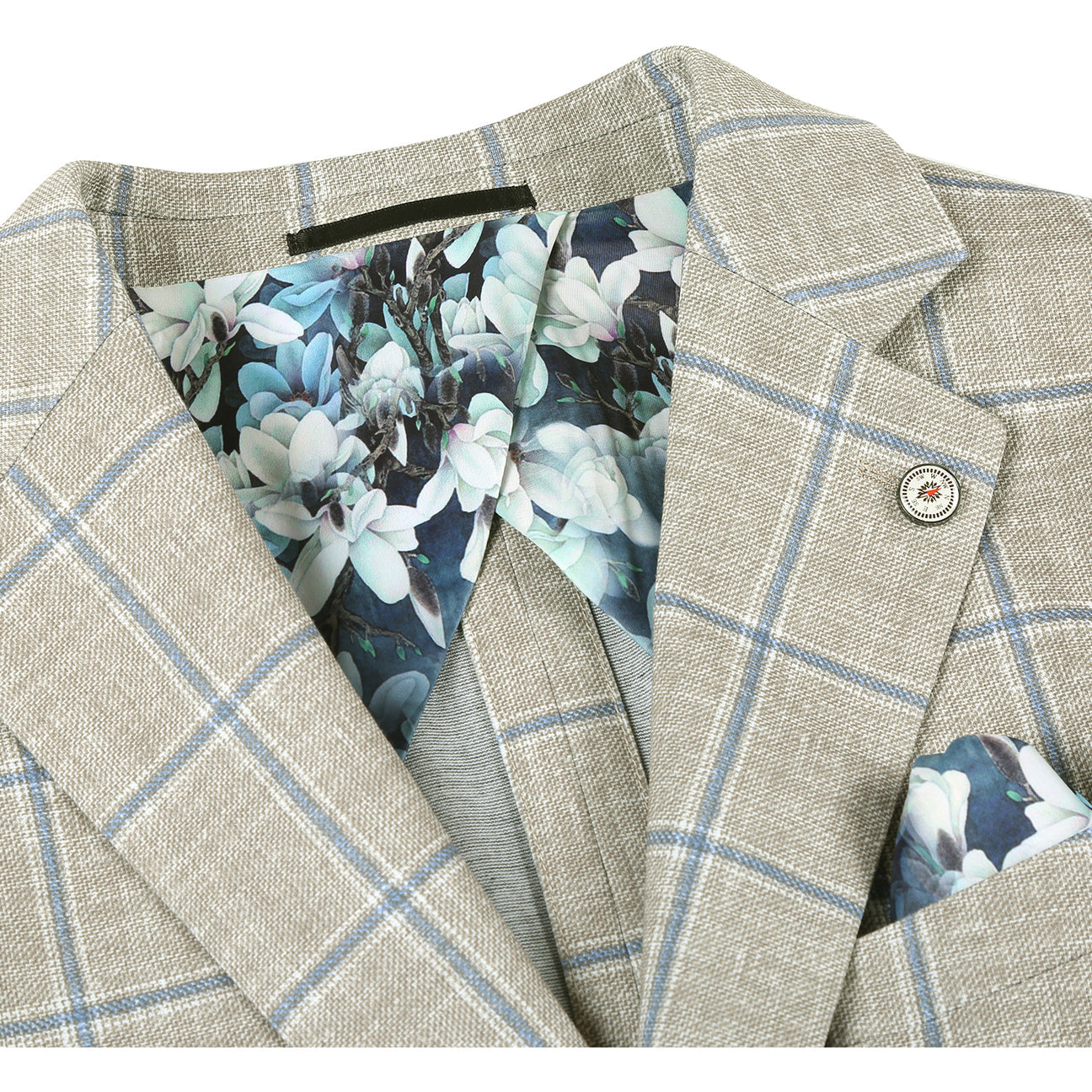 The Pellagio Green Men's Slim Fit Riserva Jacket PS26-5 by Pellagio is displayed on a mannequin with a white dress shirt, dark patterned tie, and pocket square.