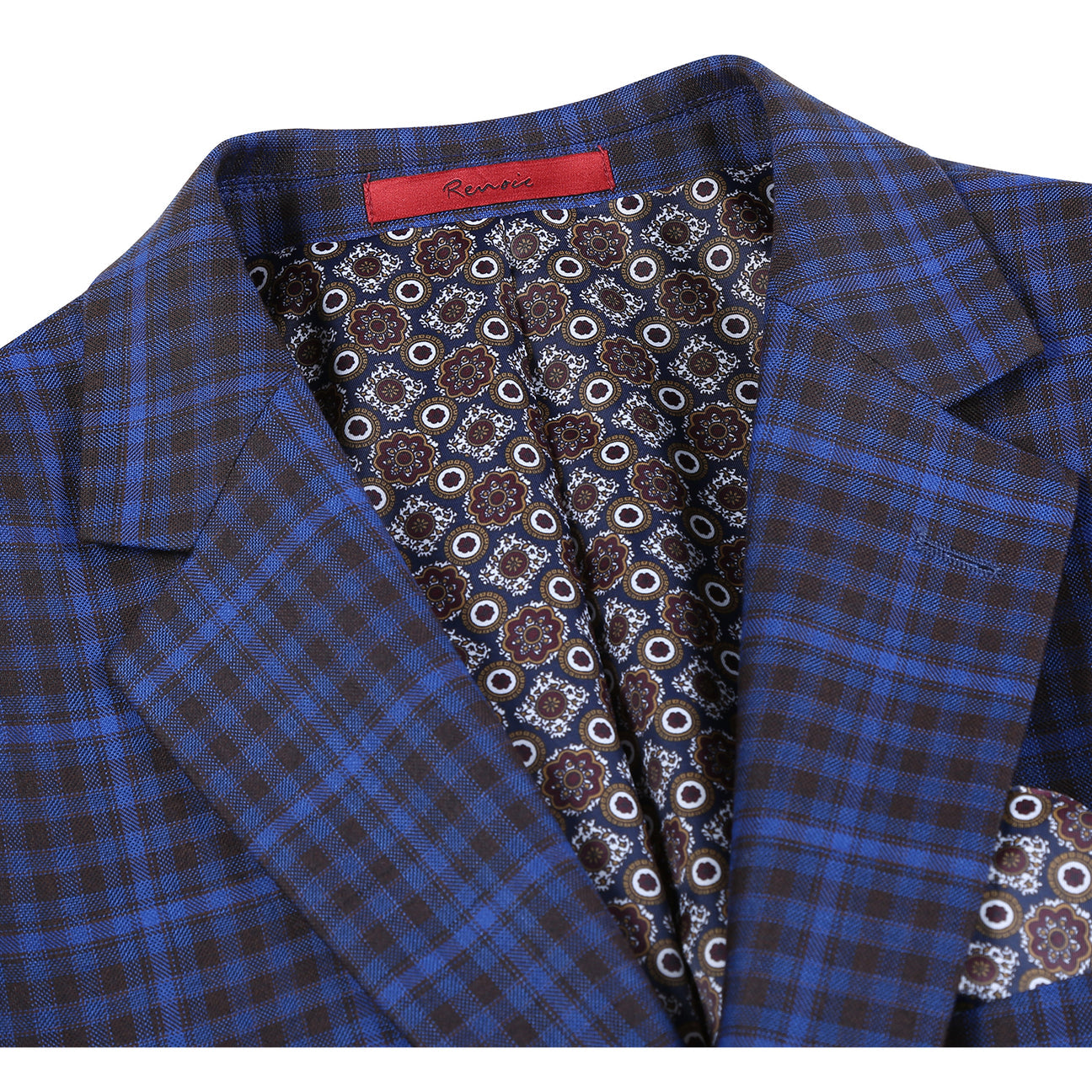 A mannequin is styled in the Renoir Alessandro Vitello New Slim Fit Blazer Blue 294-49, featuring a crisp white shirt, a striped tie, and a patterned pocket square. The sophisticated notch lapel adds an elegant touch.