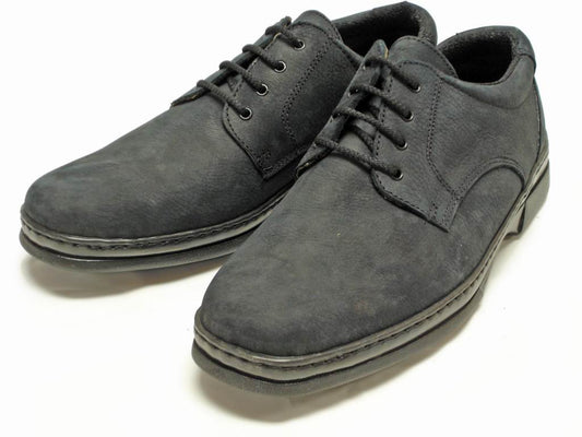 The Pinoso's P-5059 Pantera Black Lace Up, handcrafted in Spain, features black leather with visible stitching and classic lace-up design, shown on a white background.