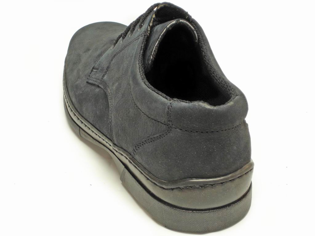 The Pinoso's P-5059 Pantera Black Lace Up, handcrafted in Spain, features black leather with visible stitching and classic lace-up design, shown on a white background.