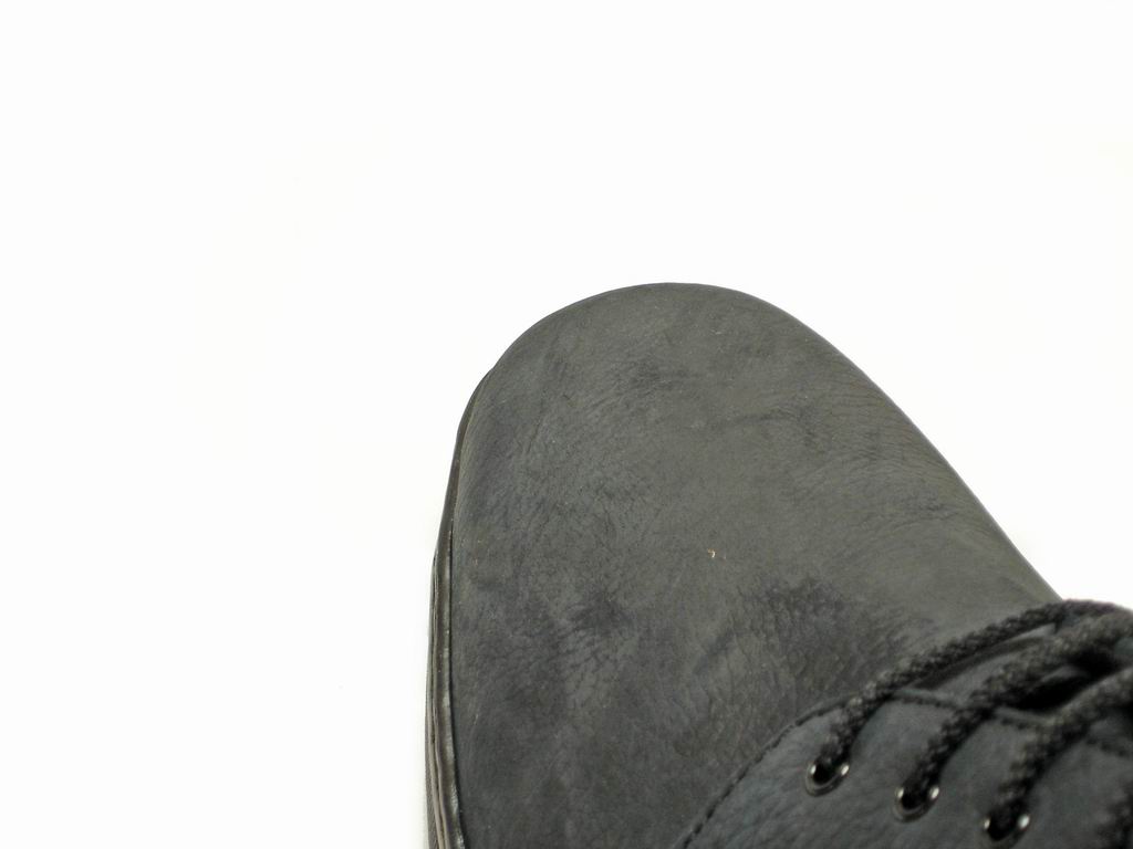 The Pinoso's P-5059 Pantera Black Lace Up, handcrafted in Spain, features black leather with visible stitching and classic lace-up design, shown on a white background.