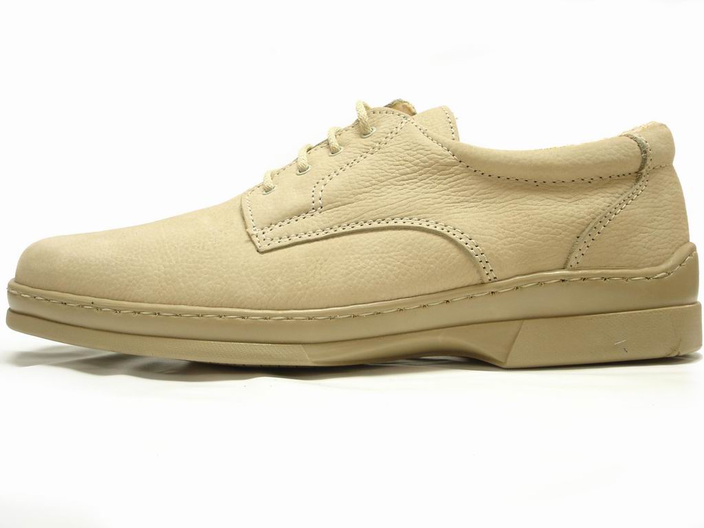 A pair of P-5059 Pantera Beige Lace up dress shoes by Pinoso's, handcrafted in Spain with visible stitching and a low heel, shown on a white background.