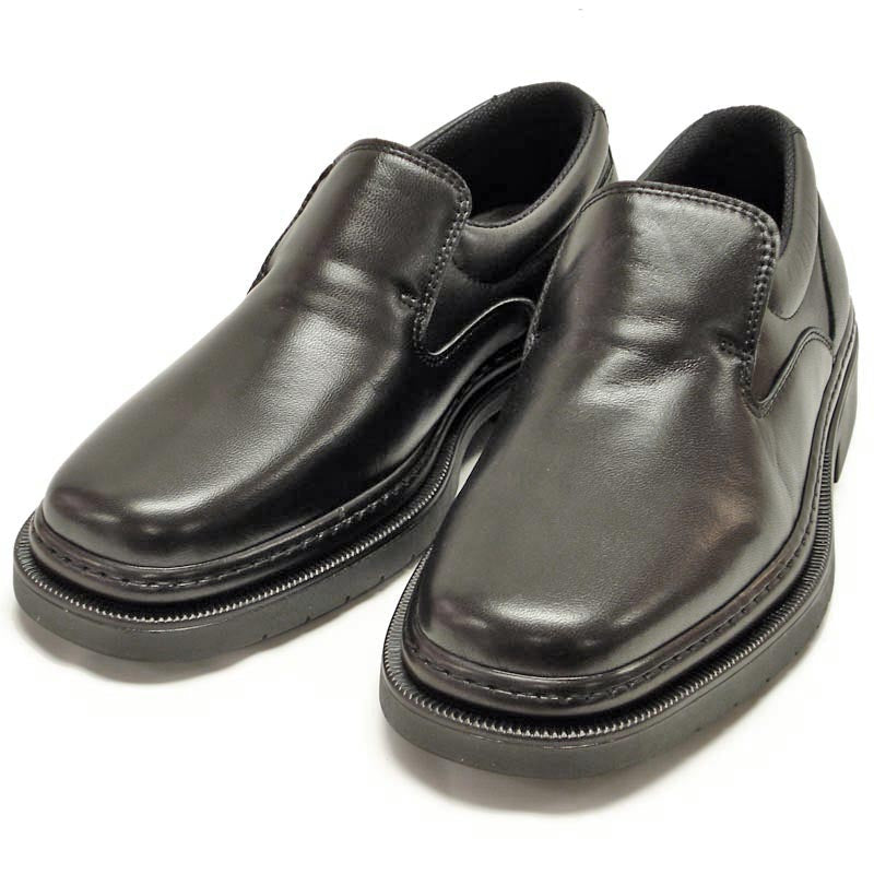 A pair of Pinoso's P-5061 Belka Black Slip-On Loafers, made in Spain, with rounded toes and thick rubber soles, are displayed side by side on a white background.