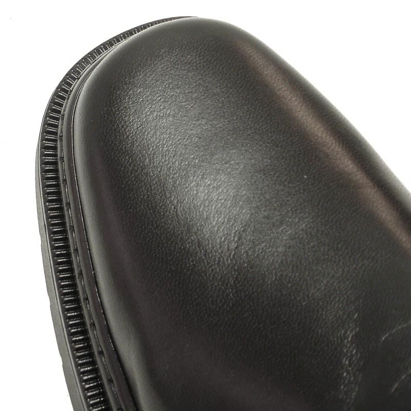 A pair of Pinoso's P-5061 Belka Black Slip-On Loafers, made in Spain, with rounded toes and thick rubber soles, are displayed side by side on a white background.