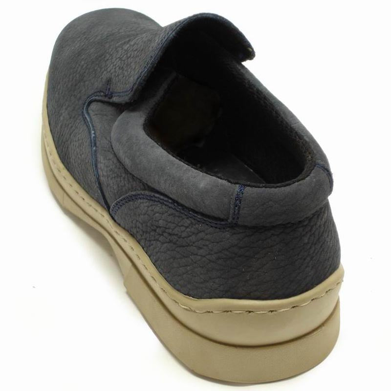 The Pinoso's P-5061 Pantera Navy Slip-On Loafer, made in Spain, features textured uppers and light beige rubber soles for all-day comfort and style.