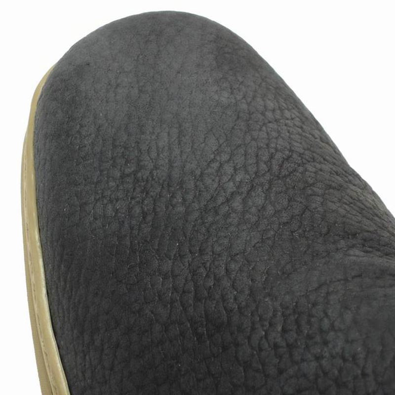 The Pinoso's P-5061 Pantera Navy Slip-On Loafer, made in Spain, features textured uppers and light beige rubber soles for all-day comfort and style.