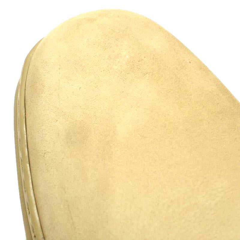 The P-5061 Pantera Beige Slip-on Loafer by Pinoso's, made in Spain, features round toes and thick rubber soles in beige Nappa leather, shown on a white background.