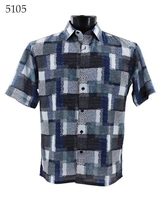 The Bassiri Short Sleeve Shirt 5105 by Bassiri is a regular fit button-up shirt that showcases a striking geometric pattern in blue, black, and white.