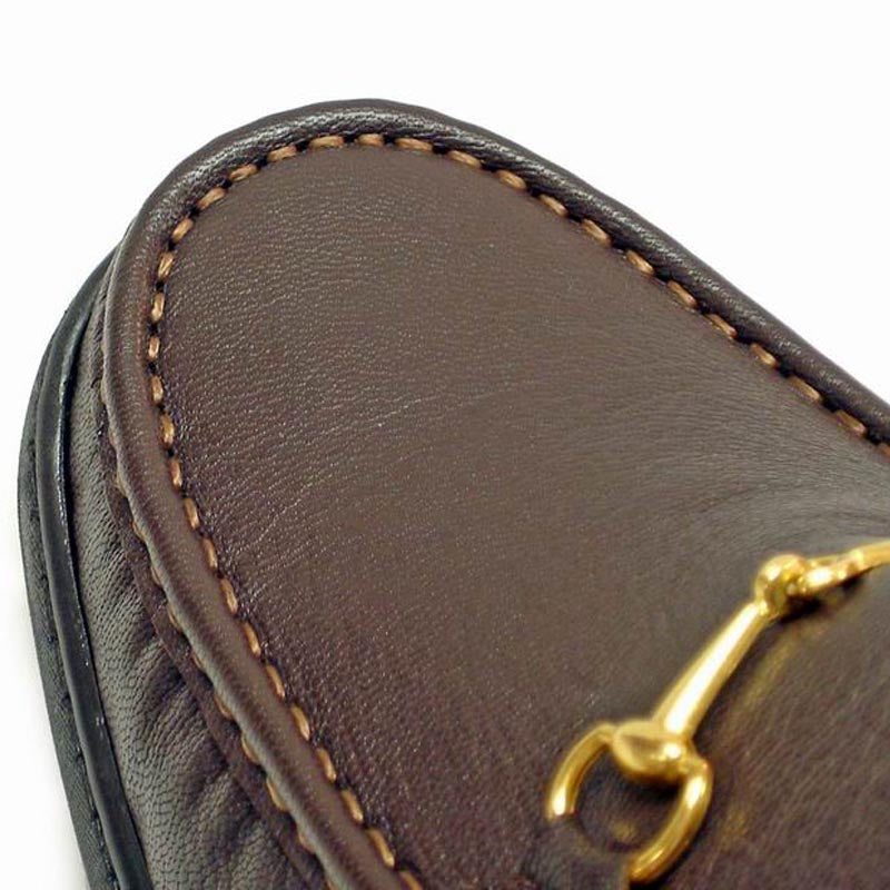 The Pinoso's P-5158 Paco Brown Slip-On Loafer features rich Nappa leather, gold horsebit detail, black rubber soles, and easy slip-on style. Made in Spain, these men's shoes offer comfort and timeless elegance.