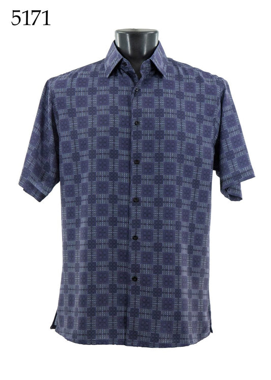 The Bassiri Short Sleeve Shirt 5171 by Bassiri features a regular fit and blue geometric check pattern, shown on a mannequin. The number 5171 appears in the top left corner.