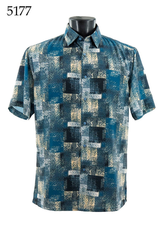 The Bassiri Short Sleeve Shirt 5177 by Bassiri features a regular fit, button-up design with blue, black, and beige abstract squares, shown on a mannequin torso with "5177" in the top left corner.
