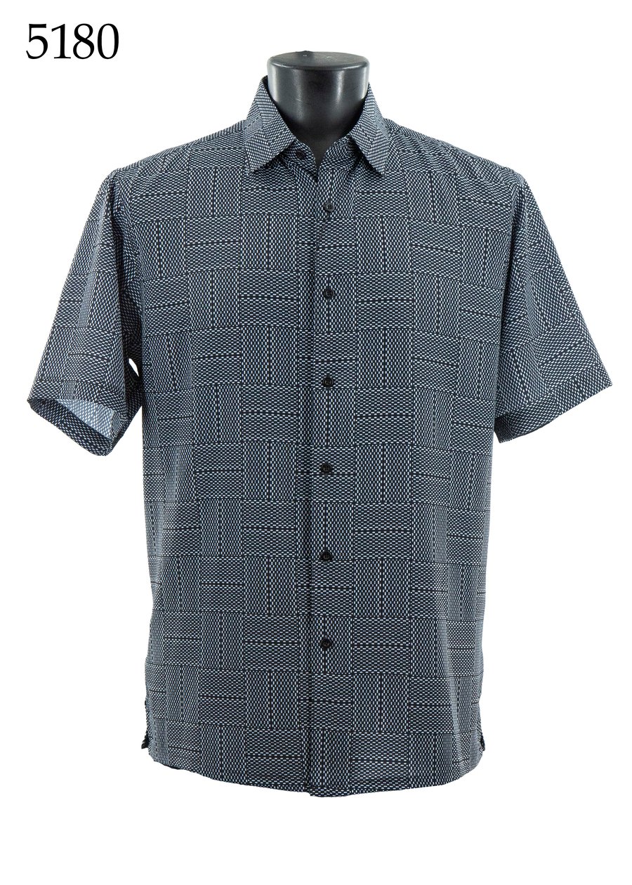The Bassiri Short Sleeve Shirt 5180 by Bassiri, featuring a regular fit and black and white geometric checkered pattern, is shown on a mannequin. The number 5180 appears in the top left corner.
