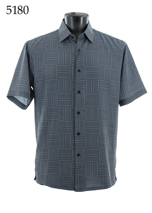 The Bassiri Short Sleeve Shirt 5180 by Bassiri, featuring a regular fit and black and white geometric checkered pattern, is shown on a mannequin. The number 5180 appears in the top left corner.
