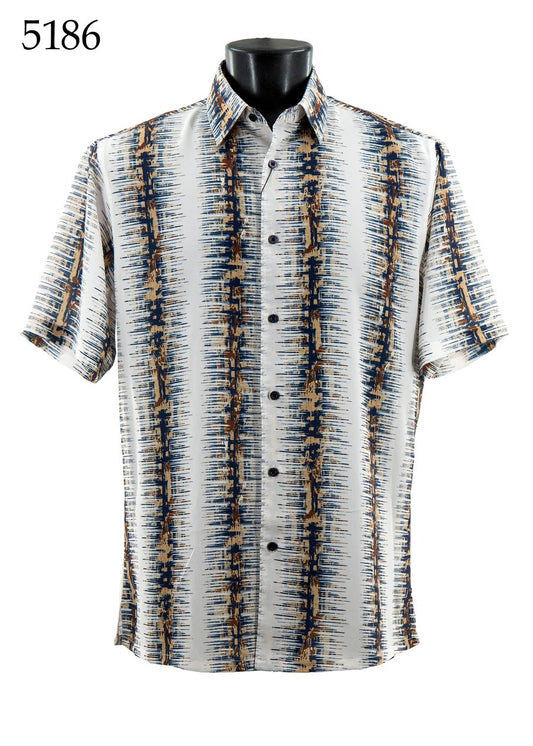 The Bassiri Short Sleeve Shirt 5186 by Bassiri features a regular fit and vertical abstract pattern in blue, brown, and beige on white. Displayed on a black mannequin with "5186" in the top left corner.