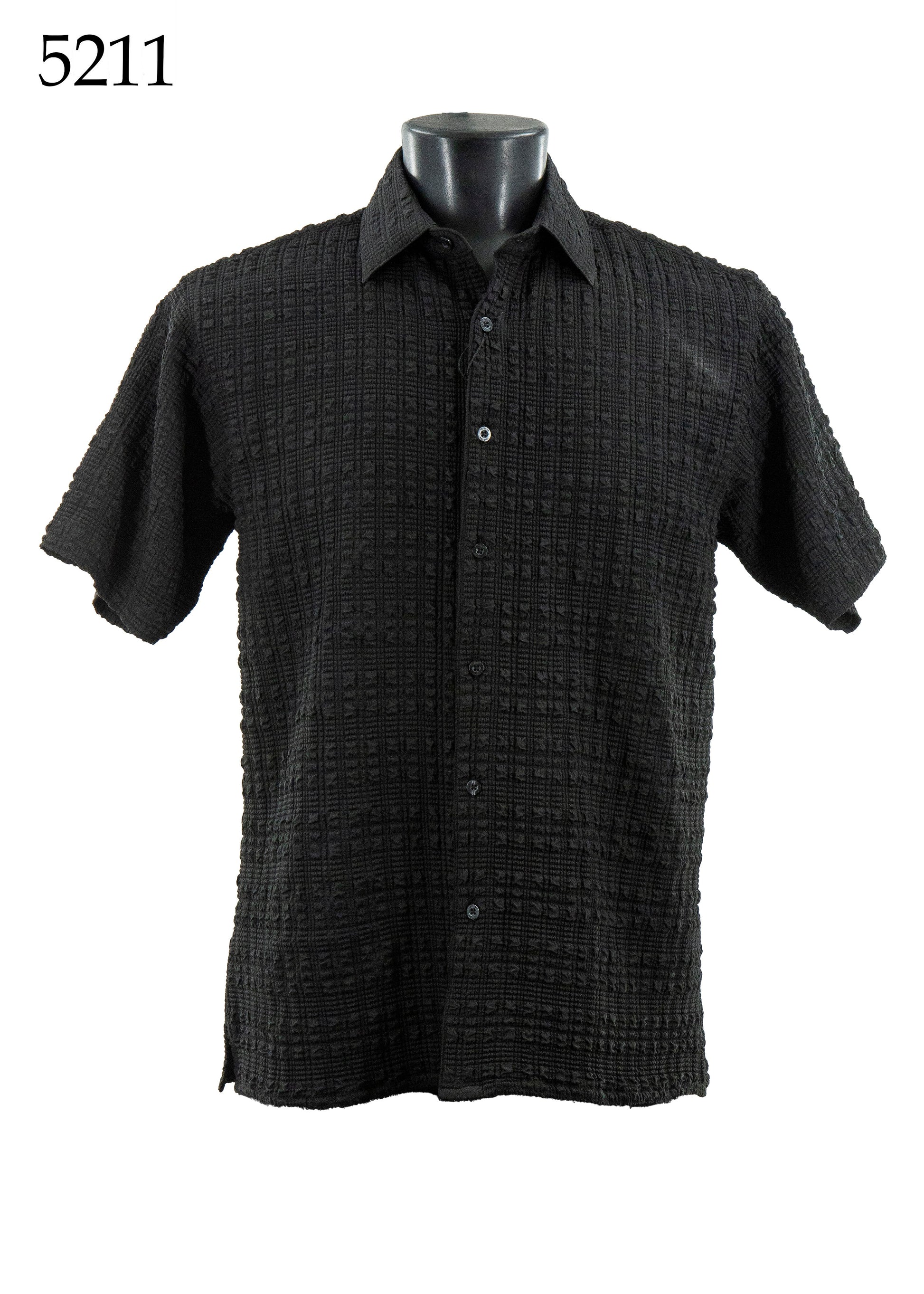 The Bassiri Short Sleeve Shirt 5211 by Bassiri is a black, regular-fit button-up with a textured checkered pattern, shown on a mannequin torso; "5211" is displayed in the top left corner.