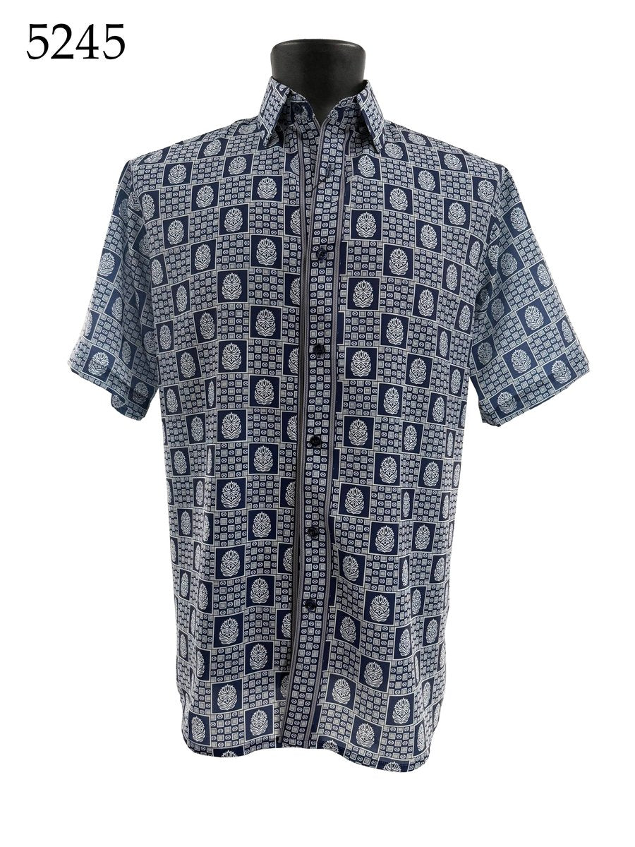 The Bassiri Short Sleeve Shirt 5245 by Bassiri features a blue and white geometric and floral pattern. Displayed on a black mannequin, the number 5245 appears in the top left corner.