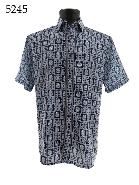 The Bassiri Short Sleeve Shirt 5245 by Bassiri features a blue and white geometric and floral pattern. Displayed on a black mannequin, the number 5245 appears in the top left corner.