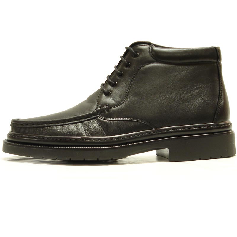 A pair of Pinoso's P-5246 Belka Black Leather Lace-up Boots—made in Spain—with thick rubber soles and detailed stitching.