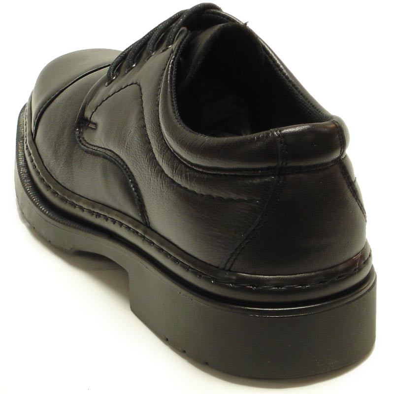 The P-5285 Belka by Pinoso's are black leather lace-up cap toe men’s shoes with thick rubber soles, handcrafted in Spain, shown side by side on a white background.