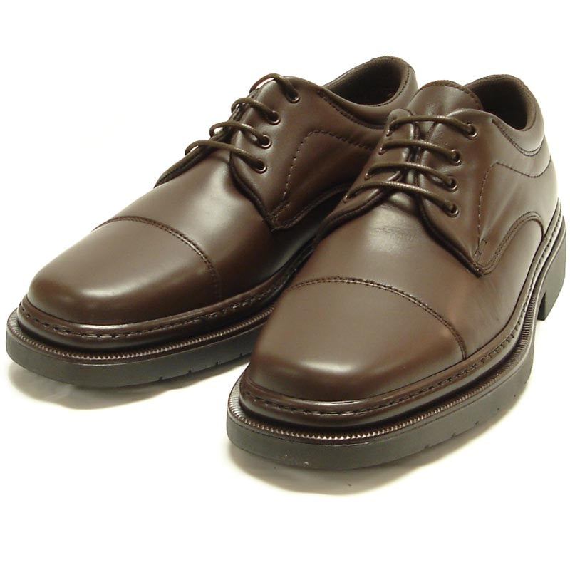 A pair of Pinoso's P-5285 Belka brown leather lace-up cap toe shoes, made in Spain, with black soles, are shown side by side on a white background.