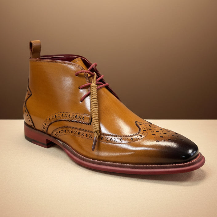 A GIOVANNI Trev Wingtip Tan Boot (FINAL SALE) crafted from genuine leather, featuring maroon laces and decorative perforations, is displayed on a wooden surface in a store.
