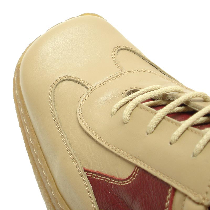 The Pinoso's P-5456 Javier Beige Red Leather Lace-up Sneaker features soft Nappa leather uppers and textured rubber soles, shown side by side. Made in Spain.