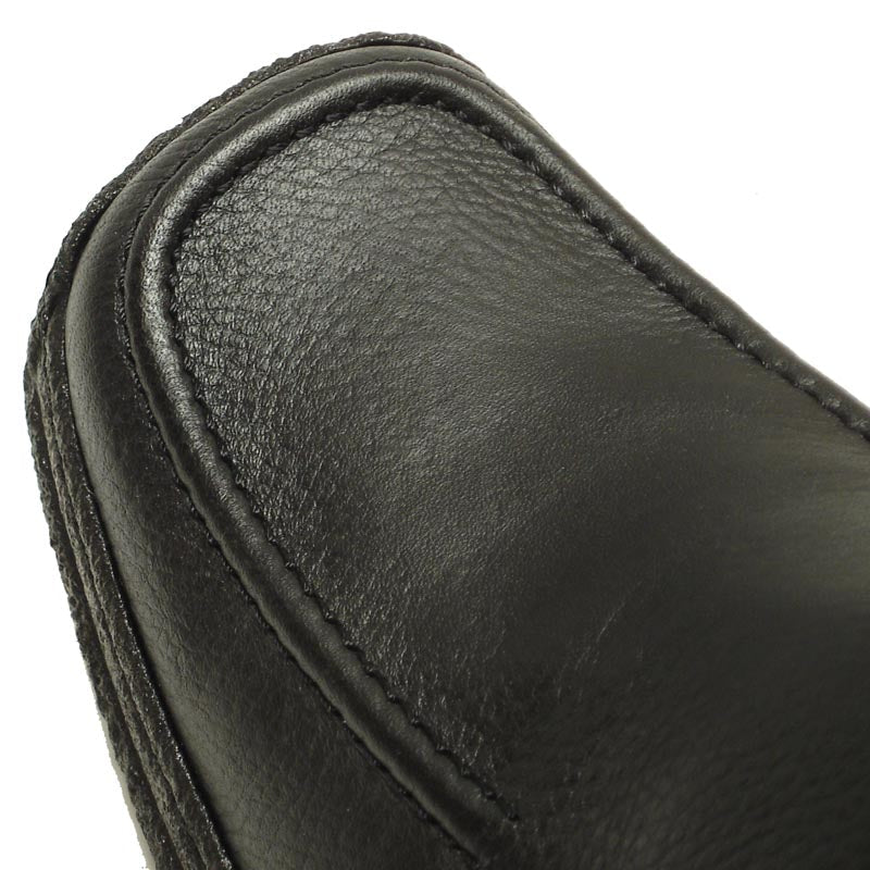 The Pinoso's P-5456 Javier Black Leather Slip-on Loafer for men features nappa leather and textured rubber soles, shown against a white background. Made in Spain.