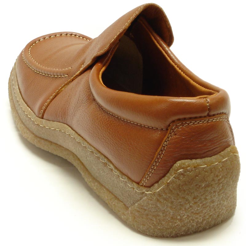 The Pinoso's P-5456 Javier Tan Leather Slip-on Loafer for men, made in Spain, features brown Nappa leather, visible stitching, and textured rubber soles, offering handcrafted comfort against a white background.