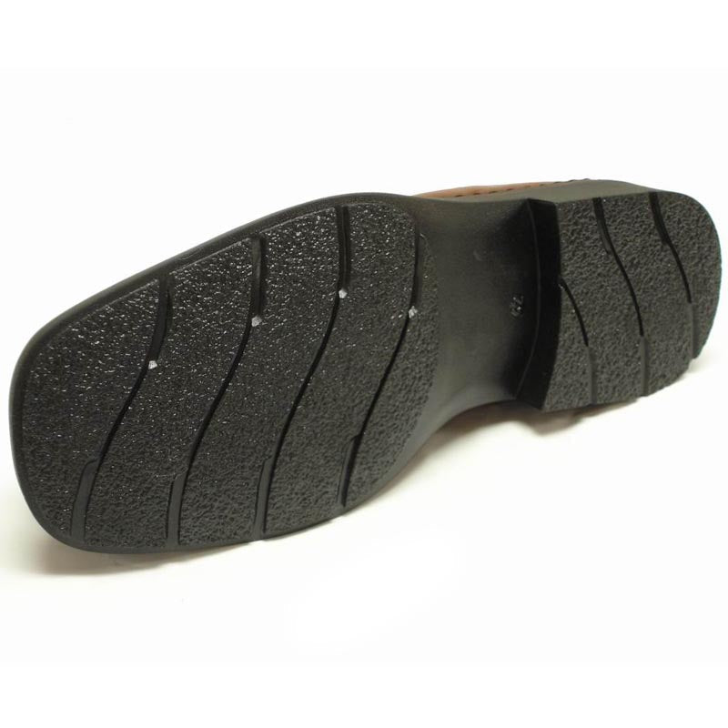 The P-5492 Goran Tan Leather Slip-on Loafer by Pinoso's, made in Spain, features a sleek design with square toes and stitched detailing along the upper edges.