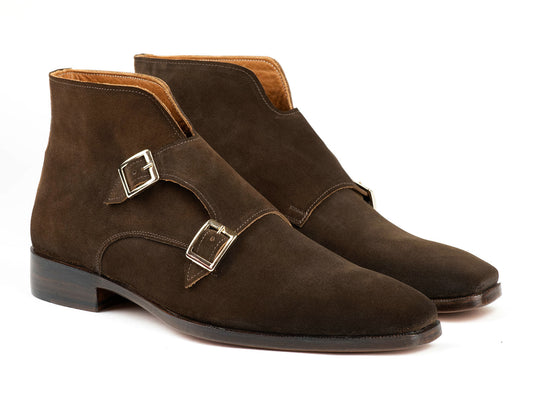 Introducing the Paul Parkman Double Monkstrap Ankle Boots in Brown Suede - 8154-SDB, showcasing a sleek design with two silver buckles and a leather sole. Experience the elegance of handmade craftsmanship that prioritizes both style and comfort.