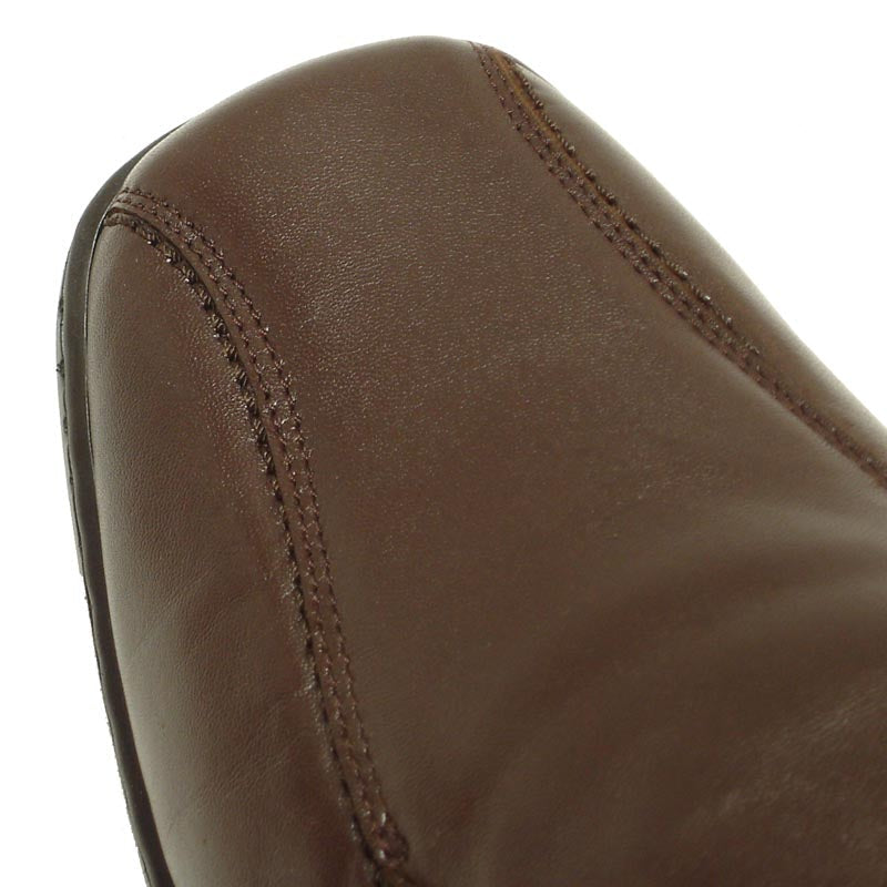 A pair of Pinoso's P-5591 Jacobo brown leather slip-on loafers, made in Spain, with black soles are placed side by side on a white background.