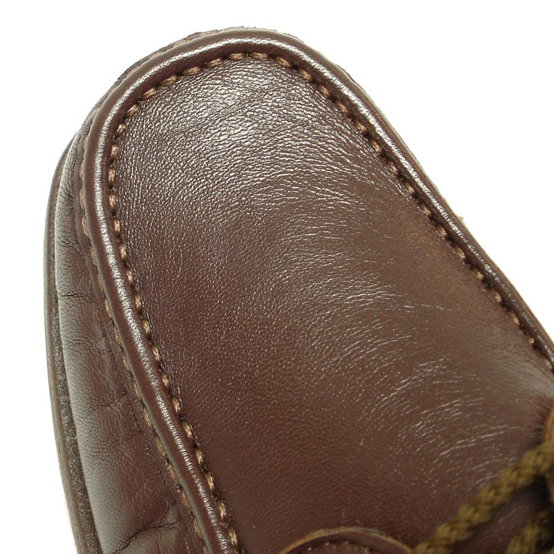 The Pinoso's P-5605-668 brown leather lace-up men's shoes, crafted in Spain with stitched detailing, are shown on a white background.