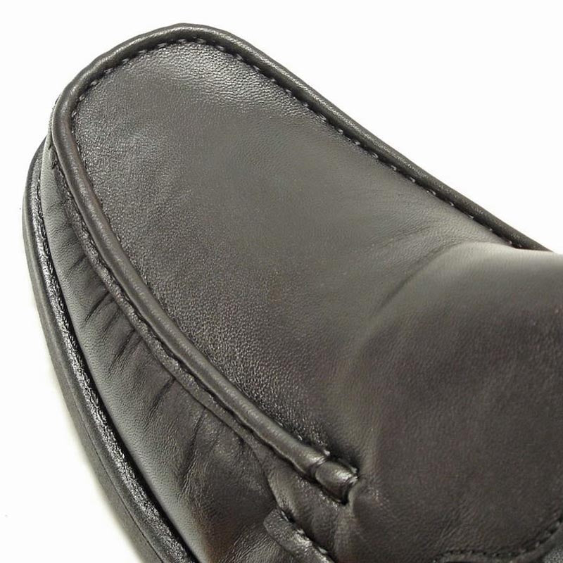 The Pinoso's P-5614-668 Black Leather Slip-on Loafer for men features visible stitching and rubber soles, and is made in Spain.