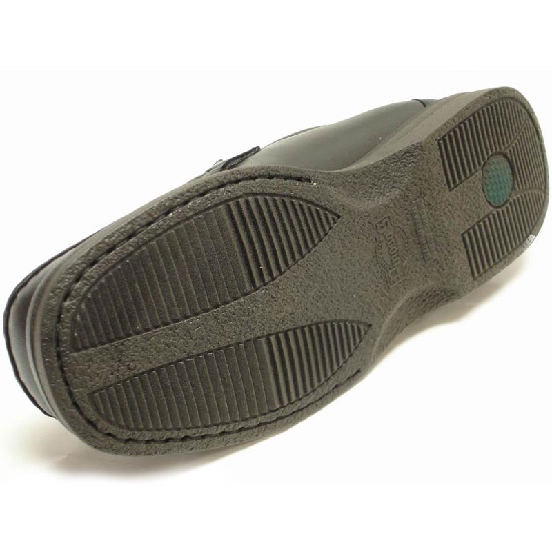 The Pinoso's P-5614-668 Black Leather Slip-on Loafer for men features visible stitching and rubber soles, and is made in Spain.