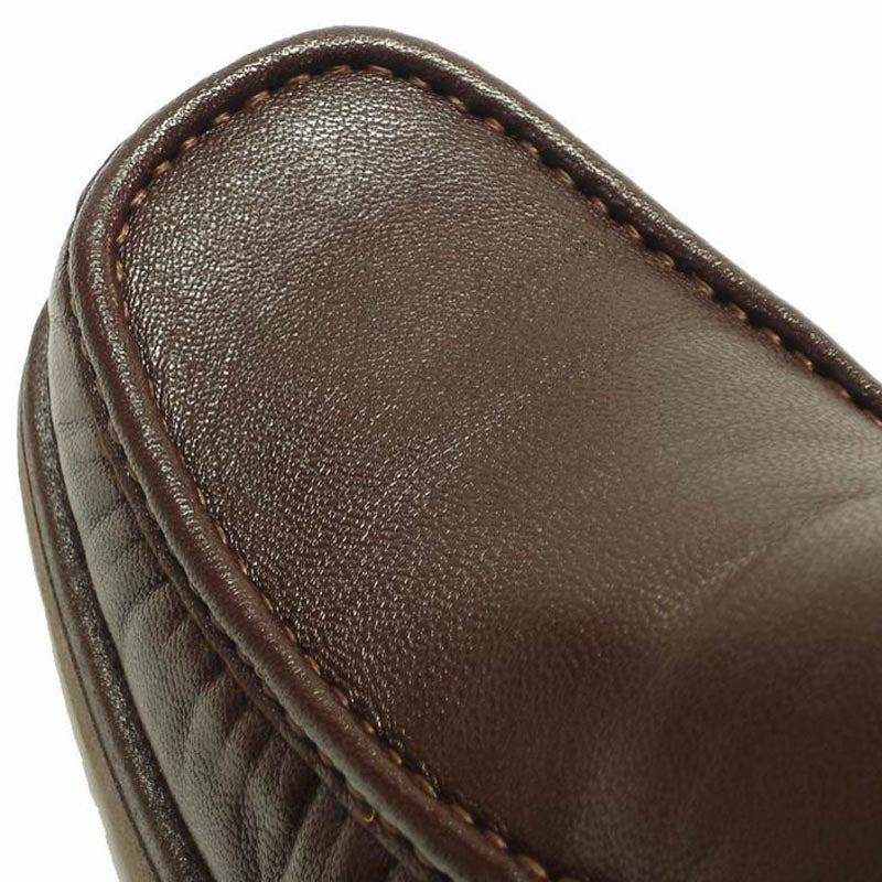 The P-5614-668 Brown Leather Slip on Loafer by Pinoso's, made in Spain, features a classic handcrafted men's loafer design with visible stitching and rubber soles, displayed side by side on a plain background.