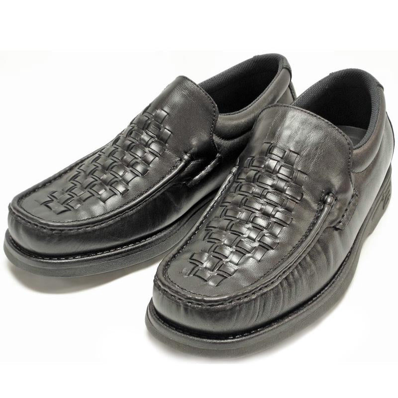 The Pinoso's P-5614-P41 Black Leather Slip on Loafer for men features a woven design and thick rubber soles. Made in Spain, these stylish Nappa leather shoes are shown against a white background.