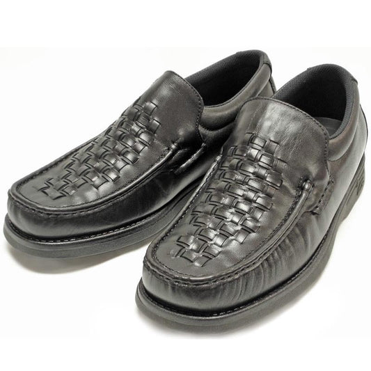 The Pinoso's P-5614-P41 Black Leather Slip on Loafer for men features a woven design and thick rubber soles. Made in Spain, these stylish Nappa leather shoes are shown against a white background.