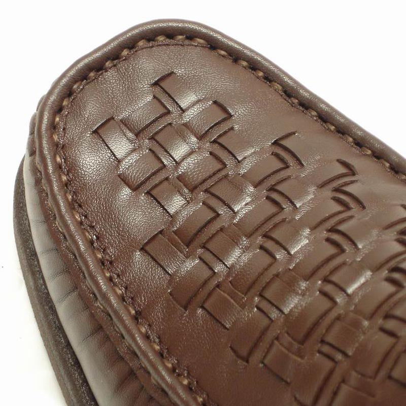 The Pinoso's P-5614-P41 Brown Leather Slip-On Loafer for men, made in Spain, features woven leather, handcrafted comfort, rounded toes, and thick rubber soles.