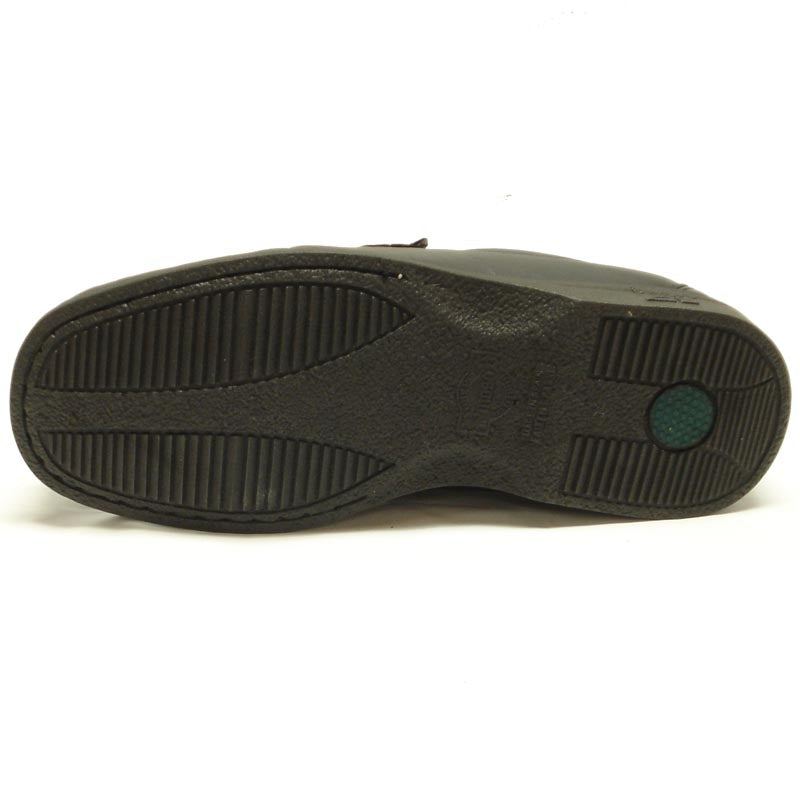 The Pinoso's P-5615-668 Black Leather Slip on Loafer for men is crafted in Spain from premium black leather, featuring a low heel and a decorative metal bit on the strap.