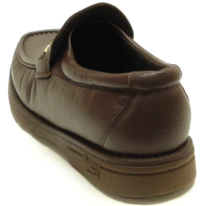 The Pinoso's P-5615-668 Brown Leather Slip-On Loafer for men, made in Spain, features nappa leather and a strap with a small gold buckle detail.