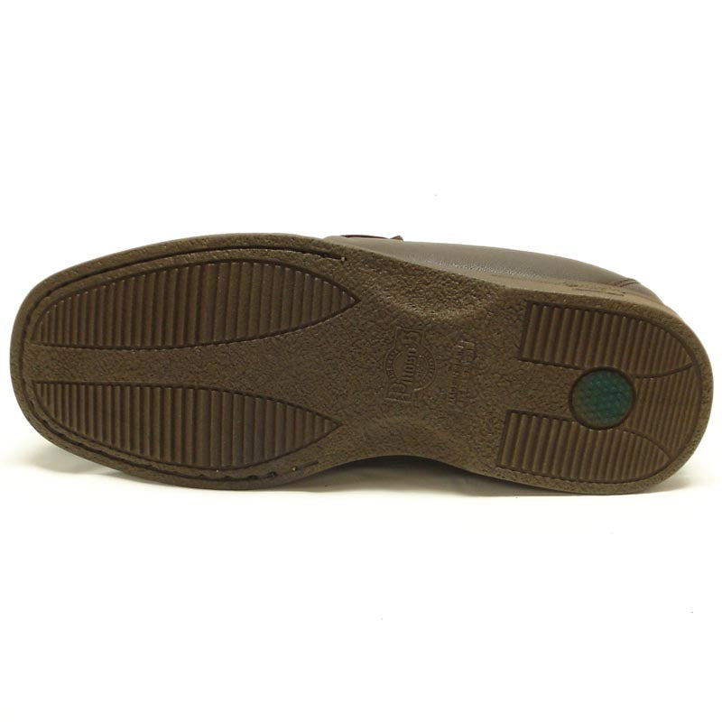 The Pinoso's P-5615-668 Brown Leather Slip-On Loafer for men, made in Spain, features nappa leather and a strap with a small gold buckle detail.