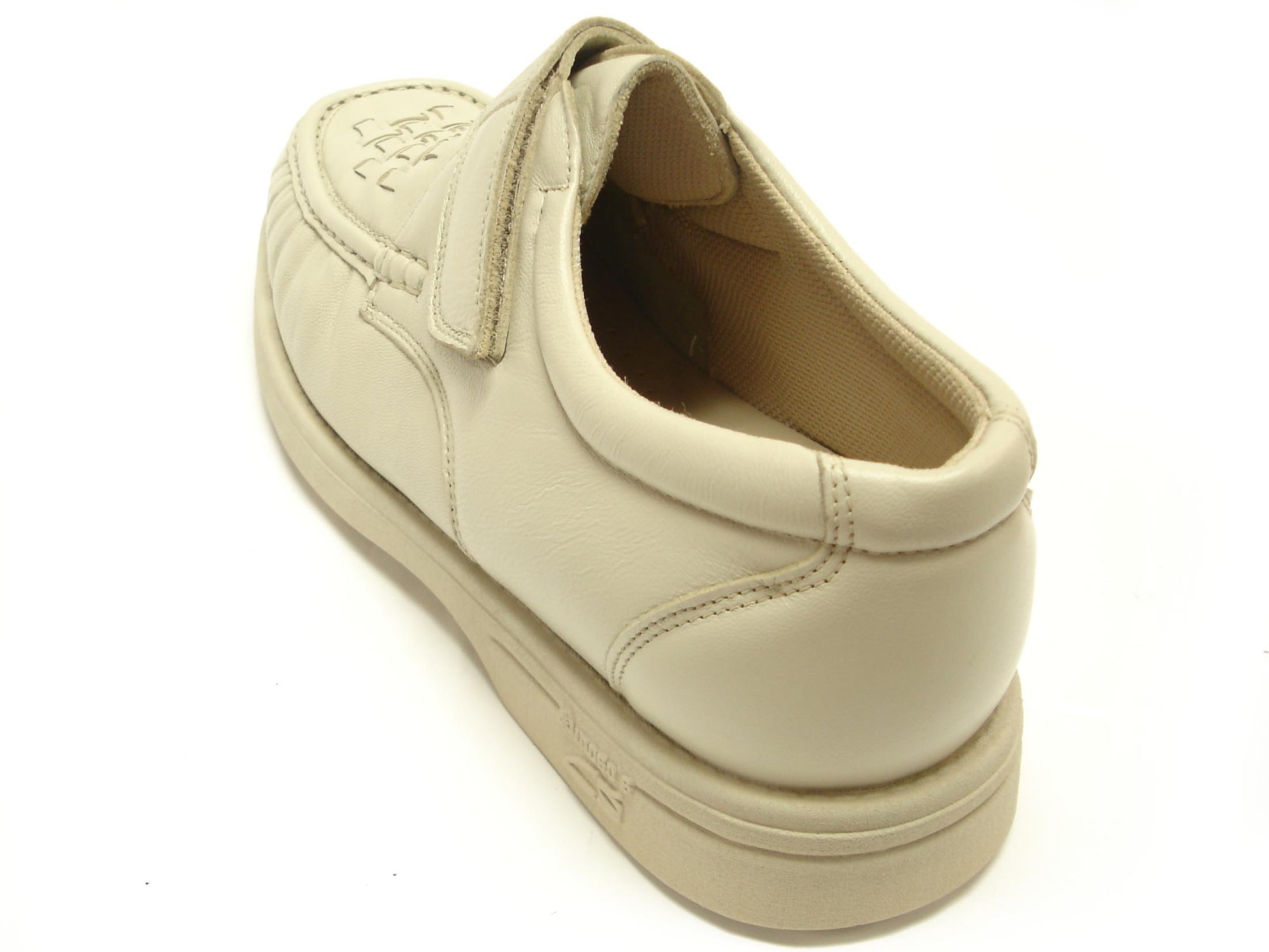The Pinoso's P-5660-P41 Beige Leather Velcro men's shoes, made in Spain, feature woven detailing and hook-and-loop straps for handcrafted comfort, shown on a white background.