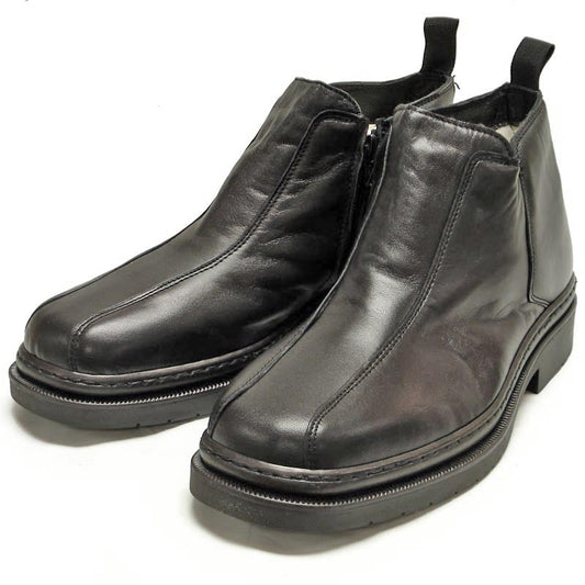 The P-5692 Belka Black Leather Boot by Pinoso's features side zippers, pull tabs, and thick rubber soles—handcrafted in Spain for men who appreciate comfort and style. Shown on a white background.