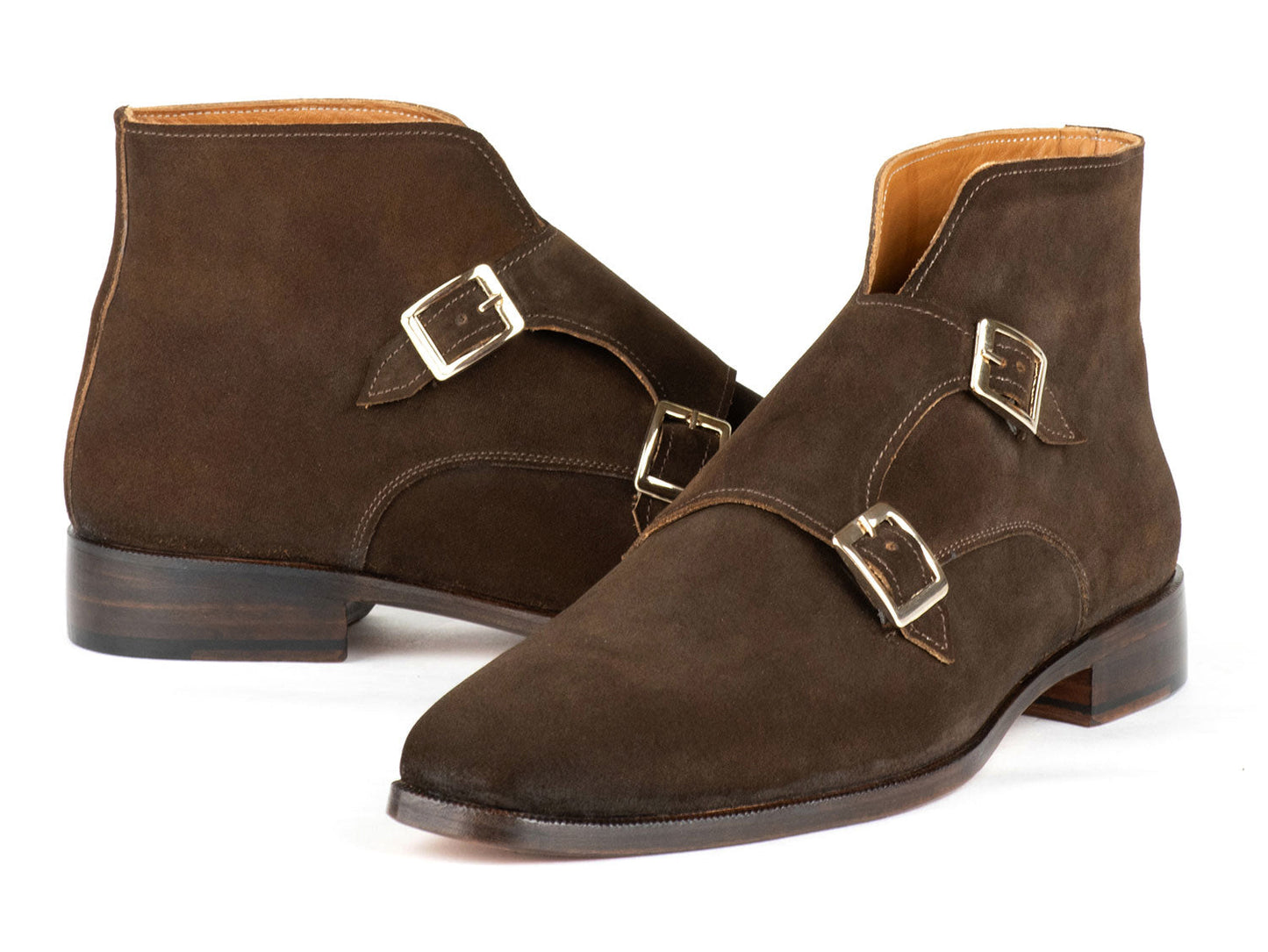 Introducing the Paul Parkman Double Monkstrap Ankle Boots in Brown Suede - 8154-SDB, showcasing a sleek design with two silver buckles and a leather sole. Experience the elegance of handmade craftsmanship that prioritizes both style and comfort.