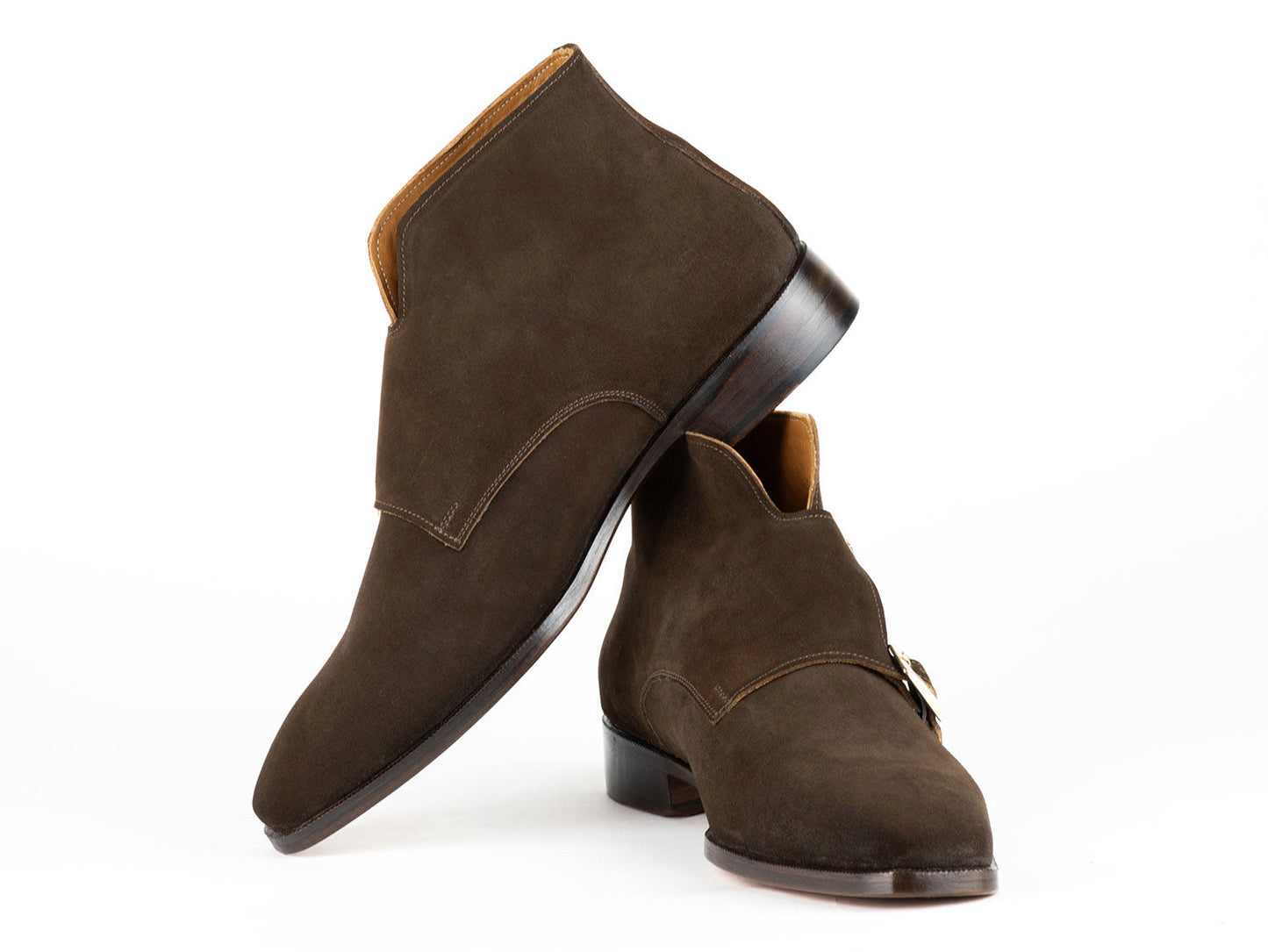 Introducing the Paul Parkman Double Monkstrap Ankle Boots in Brown Suede - 8154-SDB, showcasing a sleek design with two silver buckles and a leather sole. Experience the elegance of handmade craftsmanship that prioritizes both style and comfort.