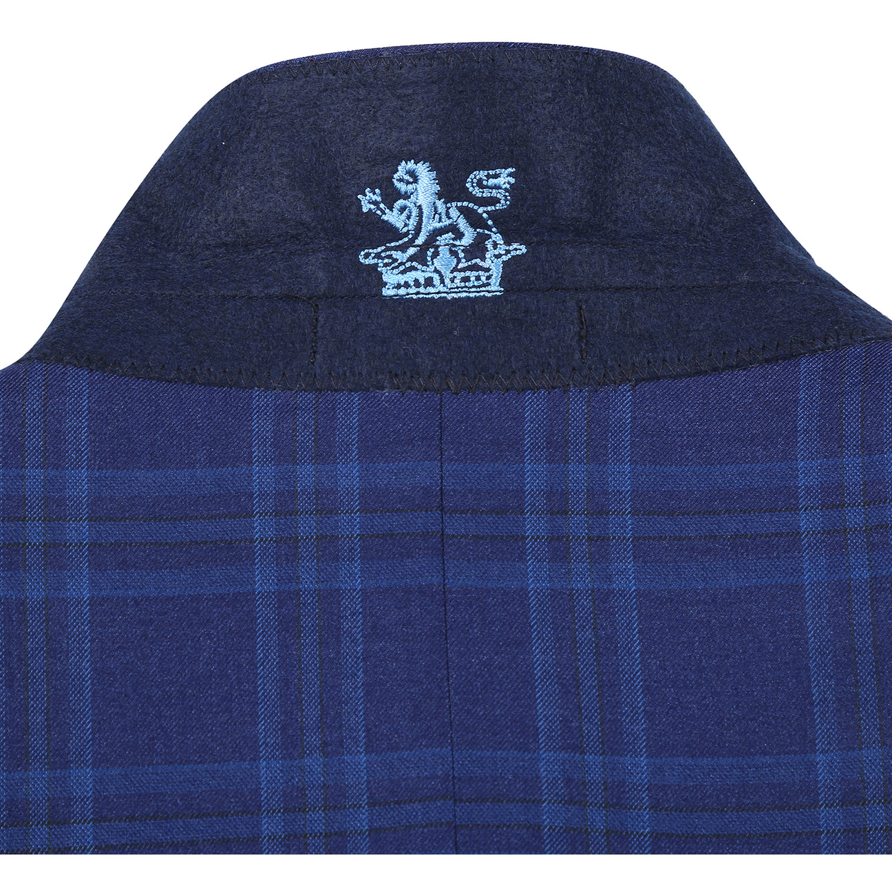 The English Laundry 2pc Suit Blue 32-60-400EL is a men's slim fit navy plaid blazer featuring a notched lapel, two-button closure, and blue patterned lining.