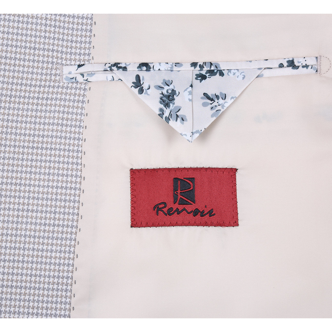 The Alessandro Vitello by Renoir Classic Fit Bib Light Beige Blazer 294-66 is displayed with a white dress shirt, dark patterned tie, and pocket square. This Renoir blazer features a notch lapel, two-button closure, and classic fit style.