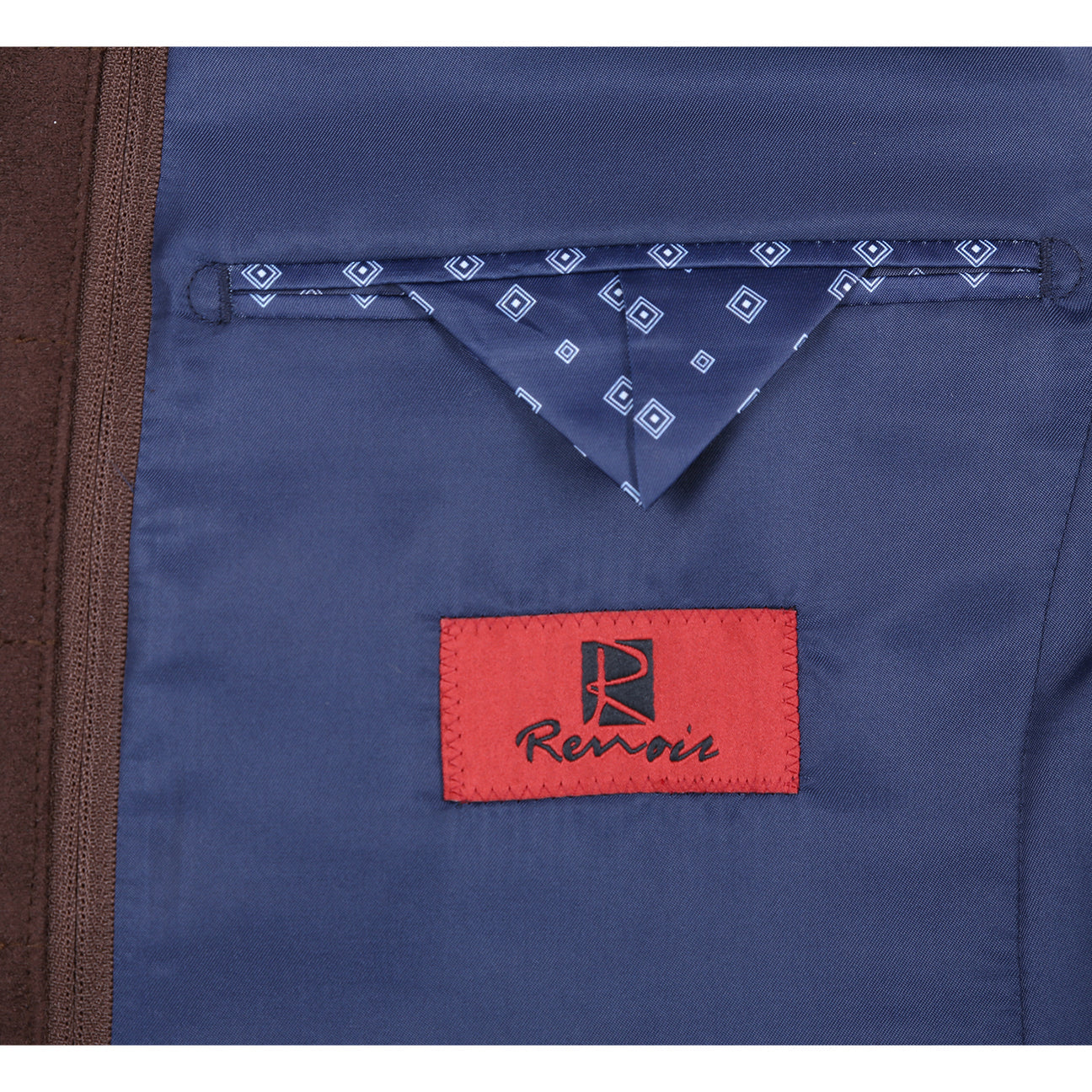 The Alessandro Vitello by Renoir Classic Fit Bib Blue Blazer 294-34, featuring a notch lapel and plaid pattern, is styled with pockets, a patterned pocket square, and worn over a brown zip-up vest.