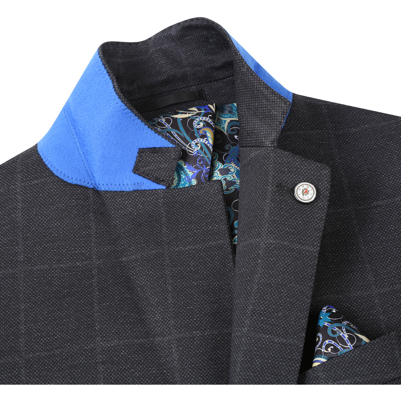 The Pellagio Ink Blue Men's Half Canvas Blazer PF24-7, featuring a single-breasted design and notched lapel, drapes elegantly on the mannequin over a crisp white shirt. A red polka dot tie and patterned pocket square complete the sophisticated ensemble.